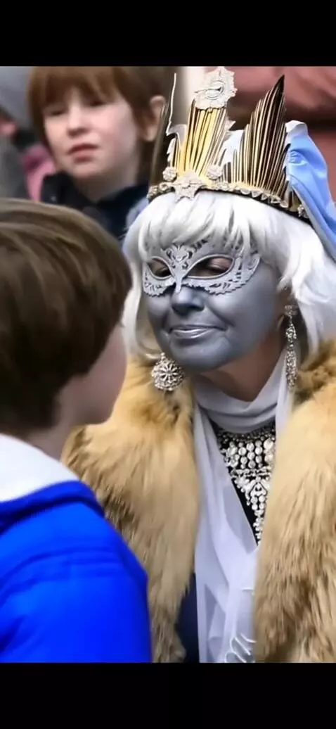 AI Video from prompt: The fifty-year-old snow queen kisses the young m