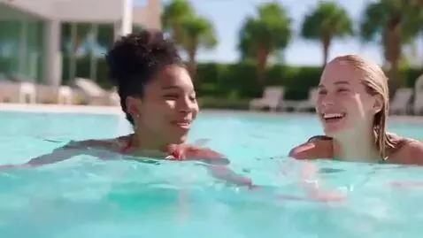 AI Video from prompt: Girls in bikini's swimming