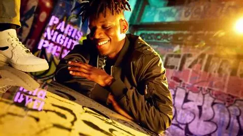 AI Video from prompt: Image-to-video: Graffiti wall bad boy subtle win