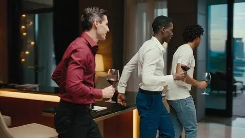 AI Video from prompt: Ronaldo and Messi drinking and saying Suii and t