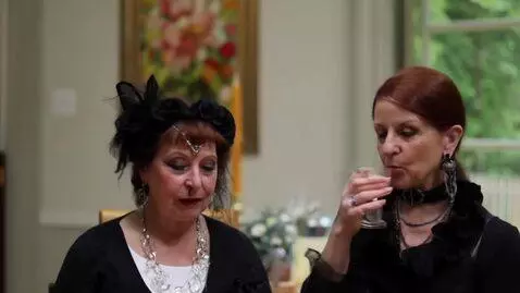 AI Video from prompt: Chubby goth middle-aged woman  dressed like a.ne