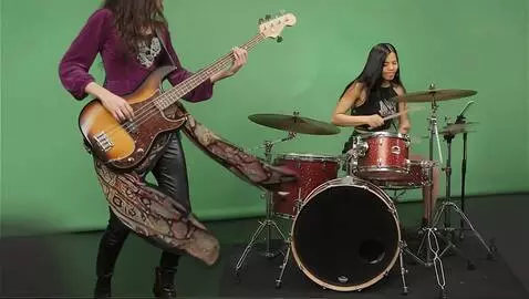 AI Video from prompt: Camera closes in on the bass player on the left 