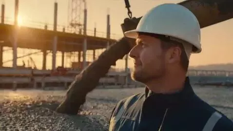 AI Video from prompt: "5-second cinematic video. Bulk cement pouring a