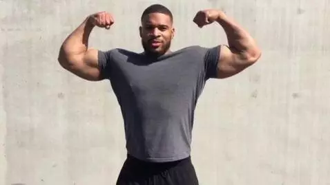 AI Video from prompt: Man flexes his muscles.
