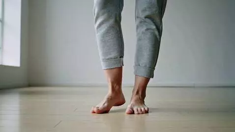 AI Video from prompt: Girl shows her bare feet.