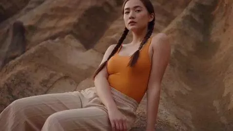 AI Video from prompt: A photo of a young, slim-bodied, busty Kazakh wo