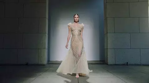 AI Video from prompt: A luxury high-fashion cinematic runway film.  Th