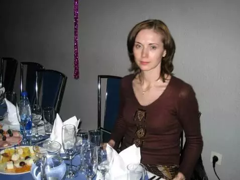 AI Video from prompt: The woman in the photograph is wearing a miniski