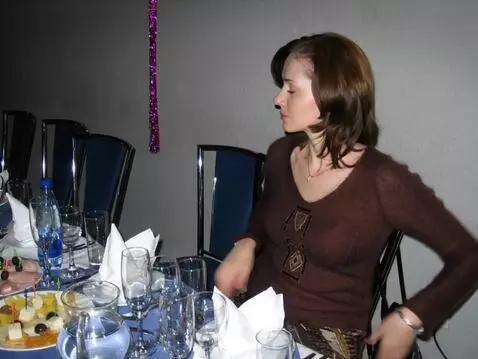 AI Video from prompt: The woman in the photograph is wearing a miniski