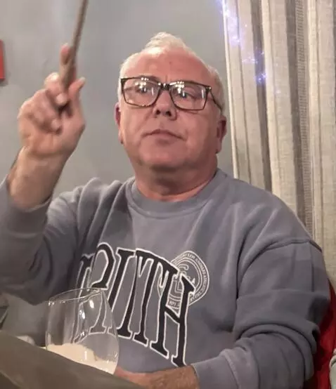 AI Video from prompt: This man should be dressed as a mage and waving 