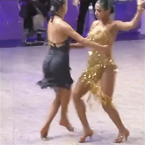 AI Video from prompt: 2 young women holding each other's hand and wais