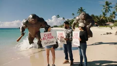 AI Video from prompt: Jurassic-style. A beach in California. Billie Ei