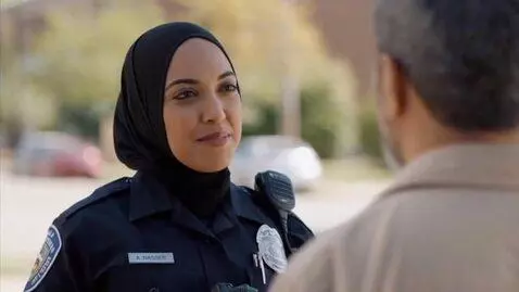 AI Video from prompt: a skinny arab police woman show her smelly feet 