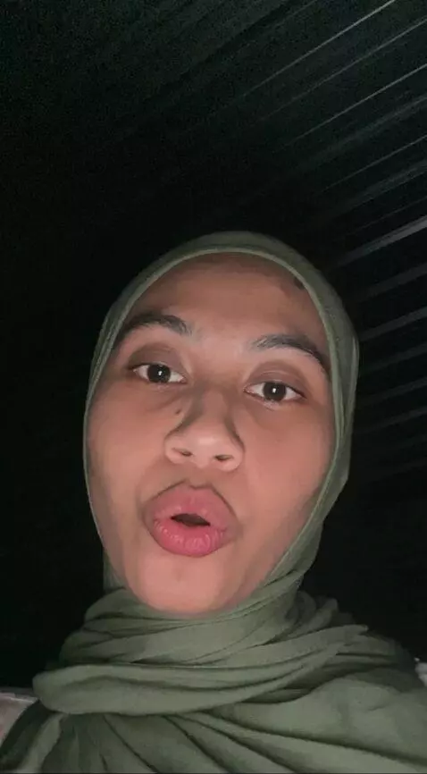 AI Video from prompt: Make her move back and forth on the spot where h