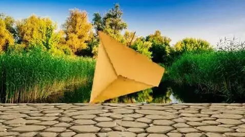 AI Video from prompt: Golden leaf letter floats on the breeze, gently 