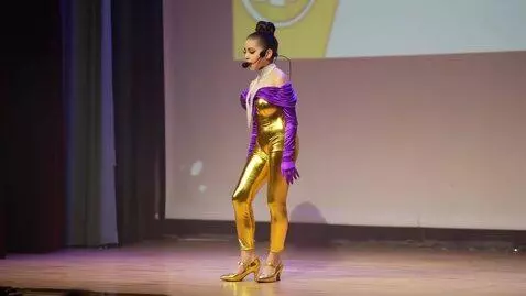 AI Video from prompt: Tajik girl, 24 years old, tight gold bodysuit on