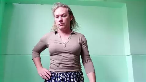 AI Video from prompt: Is she wearing a wedding dress