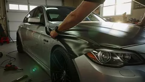 AI Video from prompt: Make it look like i m moddirning my car