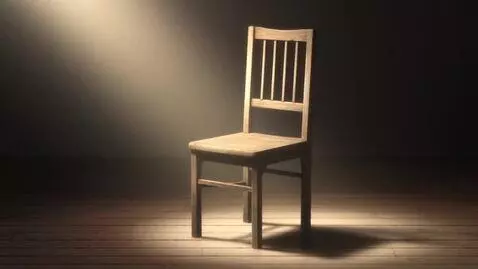 AI Video from prompt: A slow zoom toward the empty chair as dust parti