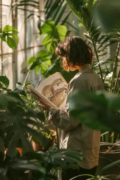 AI Video from prompt: A girl reads and flips through a book