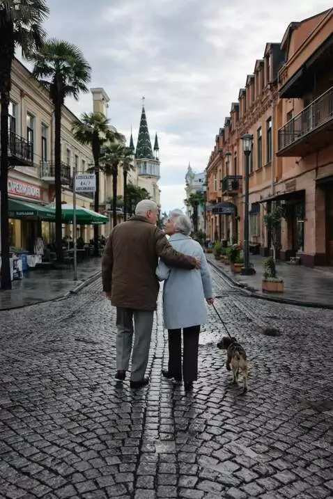 AI Video from prompt: Grandma and grandpa walk down the street and the