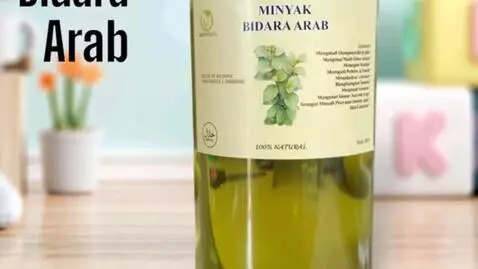 AI Video from prompt: “A bidara oil bottle moves slowly forward toward