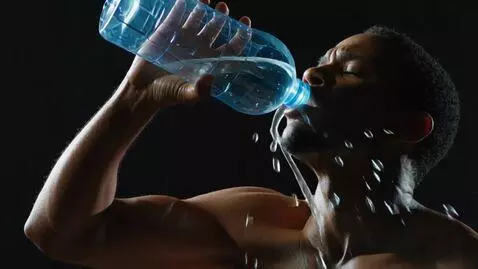 AI Video from prompt: A realistic cinematic video of a human drinking 