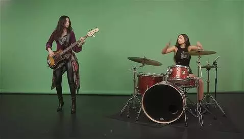 AI Video from prompt: the bass player and drummer play the music refer