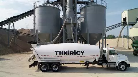 AI Video from prompt: Ultra-realistic industrial scene, bulk cement ta