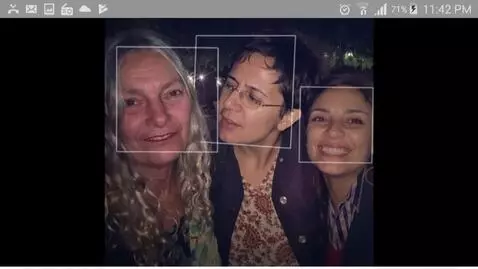 AI Video from prompt: The woman in the middle kiss the old lady