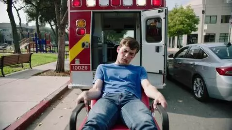 AI Video from prompt: I'm a paramedic, in first-person view, wheeling 