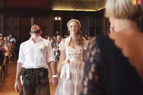 AI Video from prompt: An elderly woman standing at the altar waits for