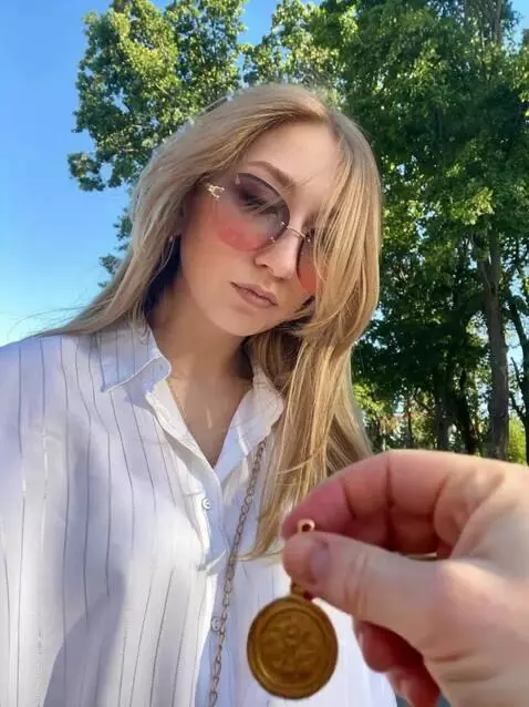 AI Video from prompt: A woman is walking in the park, but suddenly she