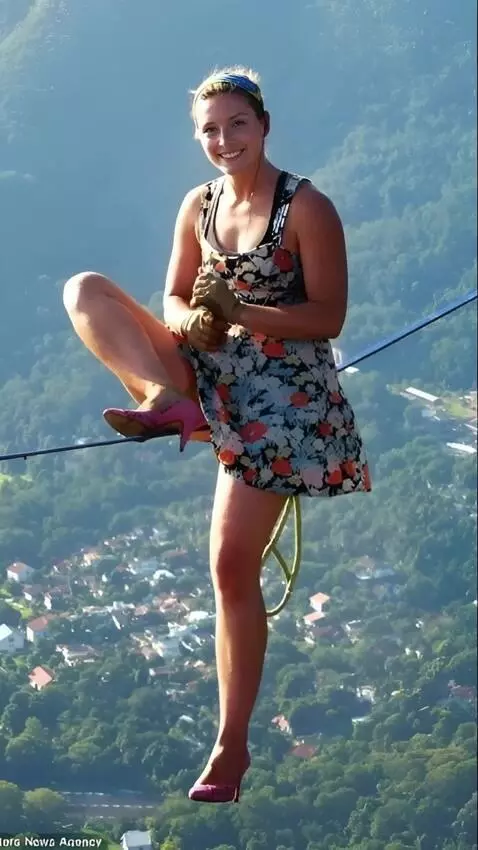 AI Video from prompt: an acrobat is sitting on a rope over a precipice