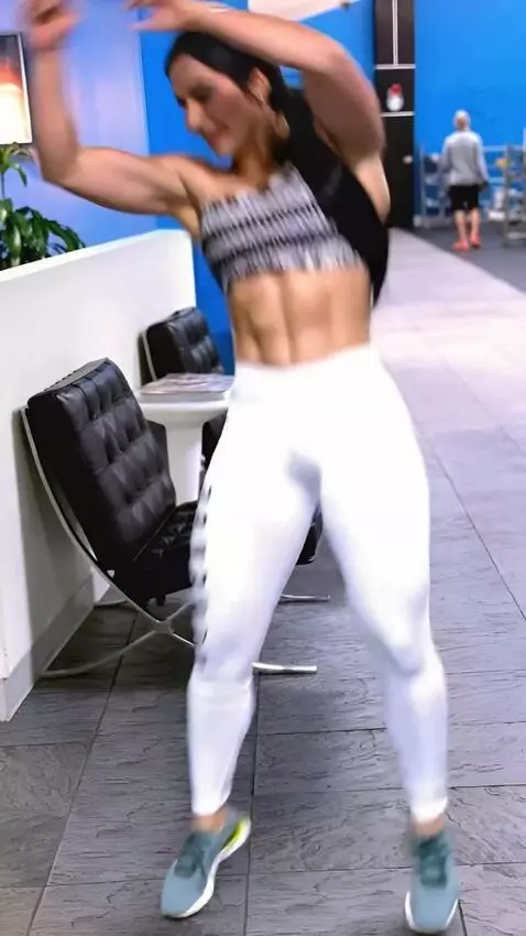 AI Video from prompt: A judo girl throws her doppelganger to the groun