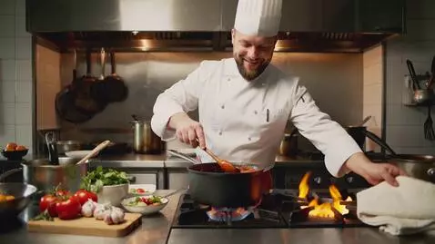 AI Video from prompt: POV of a jolly chef making spaghetti