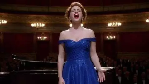 AI Video from prompt: An opera singer hits such a high octave that it 