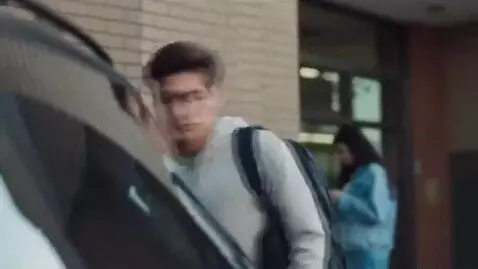 AI Video from prompt: In the early afternoon, a high school student le