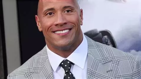 AI Video from prompt: An brown head name Dwayne Johnson called the roc