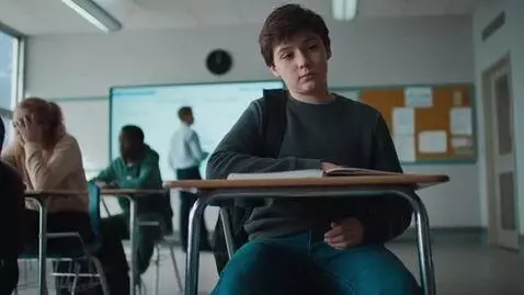 AI Video from prompt: Modern high school classroom. Teacher at the boa