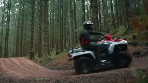 AI Video from prompt: a honda forman rubicon that is gray and red and 