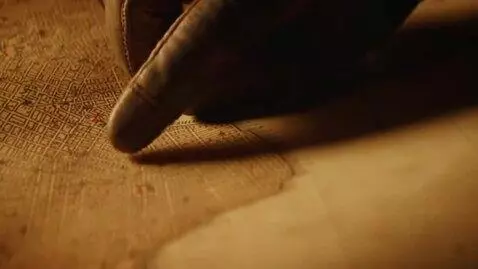 AI Video from prompt: Extreme macro close-up of a vintage, weathered p