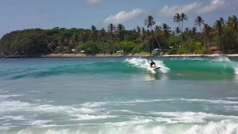 AI Video from prompt: surfing in Hawaii under sun