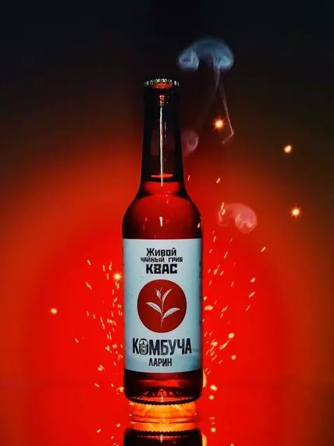 AI Video from prompt: "A glass bottle smoothly emerges from a powerful