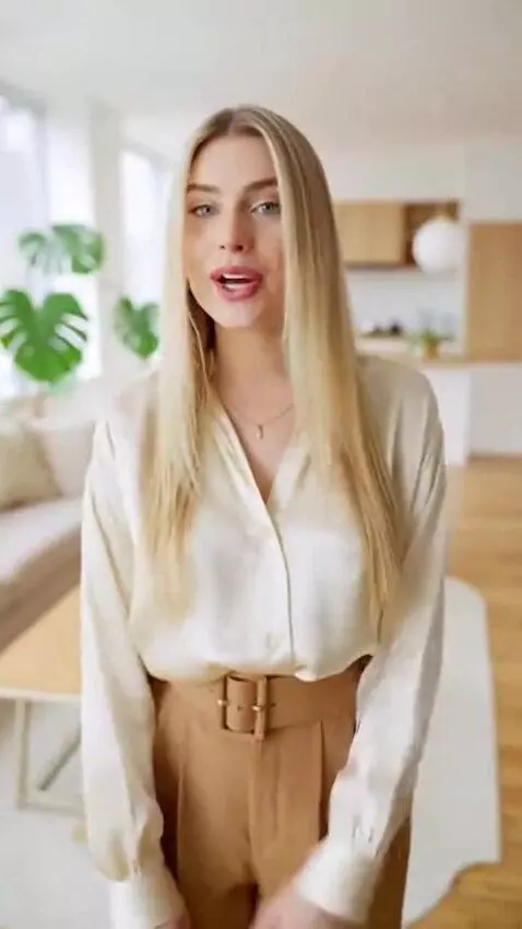 AI Video from prompt: Generate a video: A beautiful blonde girl in an 