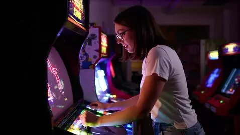 AI Video from prompt: Blythe Baxter playing Space Invaders arcade game