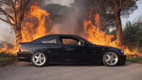 AI Video from prompt: Bmw E46 in burning forest. Camera movement zooms