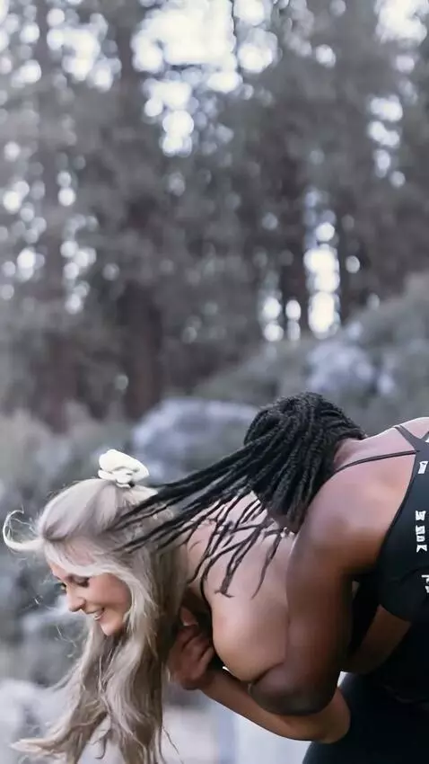 AI Video from prompt: Girl wrestler is desperately  fighting her blond