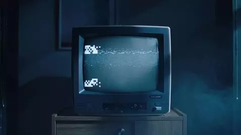 AI Video from prompt: A dark, dimly lit room. In the center stands a v