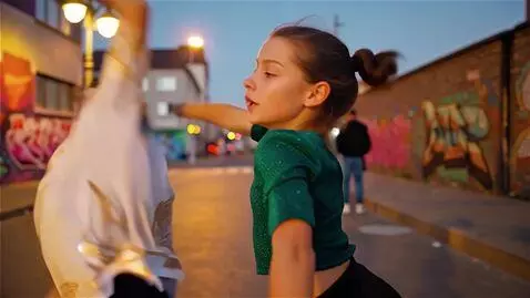 AI Video from prompt: Street dance, breakdancing, boy and girl dancing
